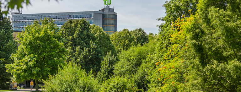 The mathematics building with green trees in the foreground.